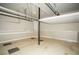 This well-lit garage features finished walls and an abundance of overhead storage at 3788 Westwick Nw Ct, Kennesaw, GA 30152
