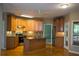 Kitchen with granite countertops, island, stainless appliances and wood floors at 3788 Westwick Nw Ct, Kennesaw, GA 30152
