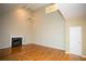 Spacious living room with hardwood floors, fireplace, vaulted ceilings, and bright lighting at 3788 Westwick Nw Ct, Kennesaw, GA 30152