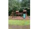 Community playground features a swing set, slide and play structure at 3788 Westwick Nw Ct, Kennesaw, GA 30152
