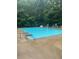 Outdoor community pool offering a refreshing space for exercise and recreation at 3788 Westwick Nw Ct, Kennesaw, GA 30152