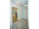 Spacious walk-in closet with shelving and access to a bright bathroom with a soaking tub at 3788 Westwick Nw Ct, Kennesaw, GA 30152