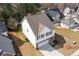 Charming two-story home with a driveway and well-maintained lawn in a Gathering-friendly neighborhood at 9122 Golfview Cir, Covington, GA 30014