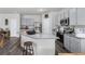 Stylish kitchen with granite counters, stainless appliances, and a large island at 9122 Golfview Cir, Covington, GA 30014