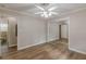 Bedroom with hardwood floors and a mirrored closet at 4485 Canary Ct, Lithia Springs, GA 30122