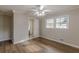 Comfortable bedroom featuring a window and hardwood floors at 4485 Canary Ct, Lithia Springs, GA 30122