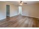 Living room featuring hardwood floors and neutral-toned walls, creating a warm and inviting atmosphere at 4485 Canary Ct, Lithia Springs, GA 30122