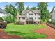 Spacious backyard with well-maintained lawn and privacy fencing at 6470 Long Island Nw Dr, Atlanta, GA 30328