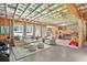 Spacious unfinished basement with exposed beams, large windows, and designated ' play area at 6470 Long Island Nw Dr, Atlanta, GA 30328