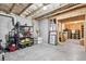 Unfinished basement with storage, shelving and concrete floors ready for customization at 6470 Long Island Nw Dr, Atlanta, GA 30328