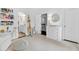 bedroom featuring a bookcase, giraffe stuffed animal, and changing table at 6470 Long Island Nw Dr, Atlanta, GA 30328