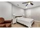 Bright bedroom features ceiling fan, hardwood floors, and white trim at 2125 Parkside Ln, Roswell, GA 30076