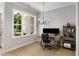 Bright office space with natural light, modern desk, and access to the outdoors at 2125 Parkside Ln, Roswell, GA 30076