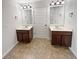 Bright bathroom featuring double vanities and ample lighting at 622 Madison Park Dr, Grayson, GA 30017