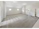 Bonus room with ample space, neutral carpet, and bright natural light at 622 Madison Park Dr, Grayson, GA 30017