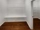 Mudroom with bench seating and coat hooks, providing convenient storage at 622 Madison Park Dr, Grayson, GA 30017