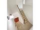 Staircase with carpeted steps and wooden banister leading to upper level at 622 Madison Park Dr, Grayson, GA 30017