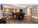 Spacious basement with a pool table and a comfortable seating area, perfect for entertaining guests at 1379 Cambridge Ne Ct, Brookhaven, GA 30319