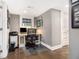 Basement office with desk, chair, and ample lighting, ideal for a productive workspace at 1379 Cambridge Ne Ct, Brookhaven, GA 30319