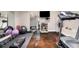 Basement gym with exercise equipment and mirrored walls, providing a great space for workouts at 1379 Cambridge Ne Ct, Brookhaven, GA 30319