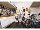 Organized garage with pegboard walls, tools, and bikes, providing storage and functionality at 1379 Cambridge Ne Ct, Brookhaven, GA 30319