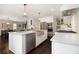 Spacious kitchen with stainless steel appliances, white cabinets, and a large island for cooking at 1379 Cambridge Ne Ct, Brookhaven, GA 30319