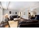 Bright living room with hardwood floors, stylish furniture, and elegant decor at 1379 Cambridge Ne Ct, Brookhaven, GA 30319