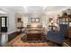 Cozy living room with hardwood floors, a decorative rug, and elegant furniture at 1379 Cambridge Ne Ct, Brookhaven, GA 30319