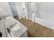 A beautifully remodeled bathroom featuring double sinks, granite countertops, and a shower/tub combo at 2231 Mill Garden Pl, Buford, GA 30519