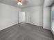 Bright bedroom featuring a ceiling fan, neutral walls, and plush carpeting at 2231 Mill Garden Pl, Buford, GA 30519