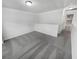 Neutral bonus room offers versatility with plush carpet and a functional layout to suit your Gathering's lifestyle at 2231 Mill Garden Pl, Buford, GA 30519
