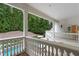 A white balcony overlooking the pool and a lush backyard at 3401 Stillhouse Se Rd, Atlanta, GA 30339