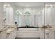 Elegant bathroom with glass shower, soaking tub, double vanity and plenty of natural light at 3401 Stillhouse Se Rd, Atlanta, GA 30339