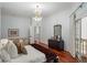 This bedroom features a chandelier and a decorative mirror at 3401 Stillhouse Se Rd, Atlanta, GA 30339