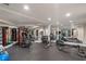 Spacious home gym with mirrored walls, state-of-the-art equipment, and rubber flooring at 3401 Stillhouse Se Rd, Atlanta, GA 30339