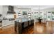 Gourmet kitchen featuring stainless appliances, large island, and custom cabinetry at 3401 Stillhouse Se Rd, Atlanta, GA 30339