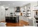 Modern kitchen with granite island, stainless steel appliances, and custom cabinetry at 3401 Stillhouse Se Rd, Atlanta, GA 30339