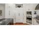 Spacious kitchen with stainless appliances, custom cabinets, and granite countertops at 3401 Stillhouse Se Rd, Atlanta, GA 30339