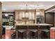 The kitchenette has bar seating with overhead lighting and easy access to the refrigerated wine cellar at 3401 Stillhouse Se Rd, Atlanta, GA 30339