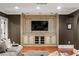 Entertainment center with integrated media storage in a sophisticated living space at 3401 Stillhouse Se Rd, Atlanta, GA 30339