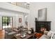Living room showcasing fireplace, hardwood floors, and high ceilings at 3401 Stillhouse Se Rd, Atlanta, GA 30339