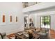 Spacious living room with views from the upper floor and a black steel front door at 3401 Stillhouse Se Rd, Atlanta, GA 30339