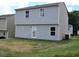 This is a two story house with grey siding and a grassy backyard at 515 Brady Dr, Villa Rica, GA 30180