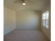 Spacious bedroom featuring carpeted flooring, smooth walls, and abundant natural light at 515 Brady Dr, Villa Rica, GA 30180