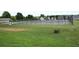 Community amenities include fenced tennis courts that are perfect for outdoor recreational activities at 515 Brady Dr, Villa Rica, GA 30180
