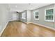 Finished basement featuring laminate flooring and multiple windows for natural light at 5807 Brookstone Nw Walk, Acworth, GA 30101