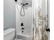 Bathroom shower with white subway tile and dark bronze fixtures at 5807 Brookstone Nw Walk, Acworth, GA 30101