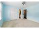 Bedroom with a ceiling fan, a window with blinds, neutral carpet, and ensuite bathroom at 5807 Brookstone Nw Walk, Acworth, GA 30101