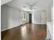 Spacious bedroom featuring hardwood floors, a ceiling fan, and a walk-in closet at 5807 Brookstone Nw Walk, Acworth, GA 30101