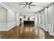 Open concept living room and kitchen with large island and hardwood floors at 5807 Brookstone Nw Walk, Acworth, GA 30101